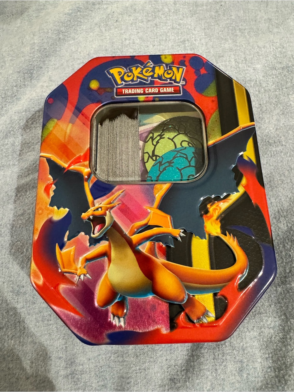 MISC Pokemon Cards in Charizard Collector Tin - Orange